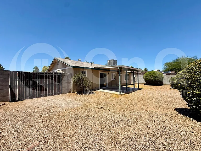 2465 E John Cabot Rd — Photo 2