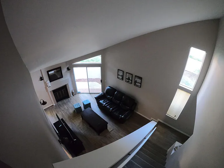 View of the family room from the top of the stairs.