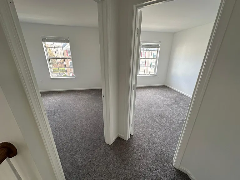 Upstairs hallway looking into two spare bedrooms