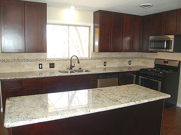 Pardon Our Sawdust  --- We will take new photos to show you shiny wood floors after the tradesmen finish and the cleaning crew follows them.