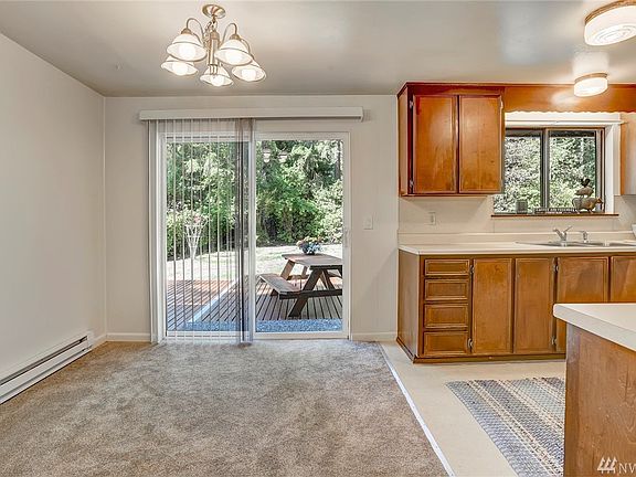 The dinning area is open to the kitchen. Extended entertaining space with access to the large back deck. 