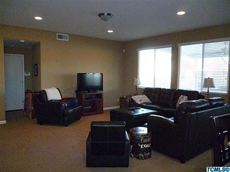 Living room is open to kitchen and dining room