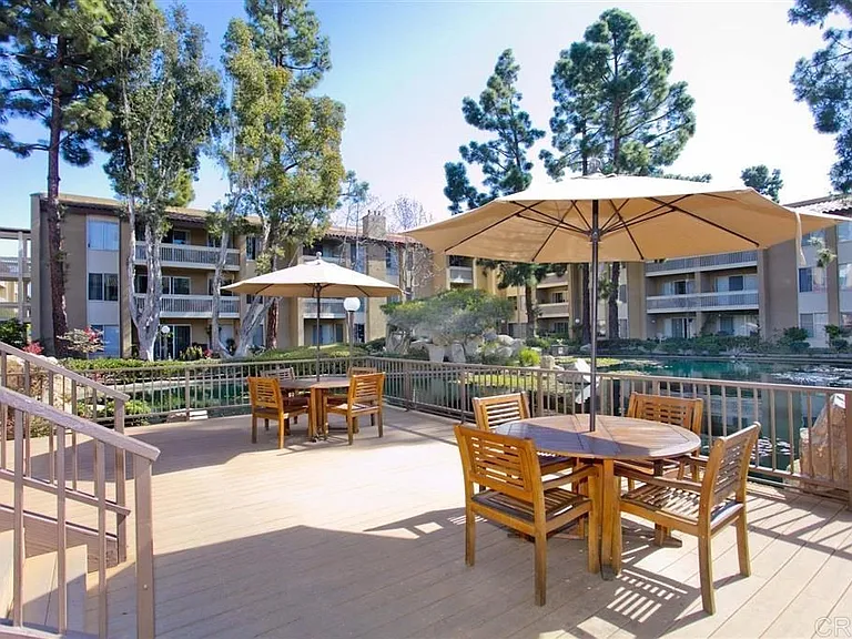 Expansive desk with multiple seating areas overlooking the lagoon