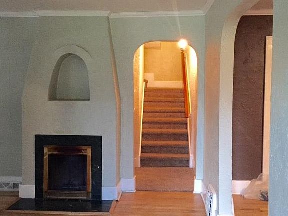 living room facing the stairs to upstairs