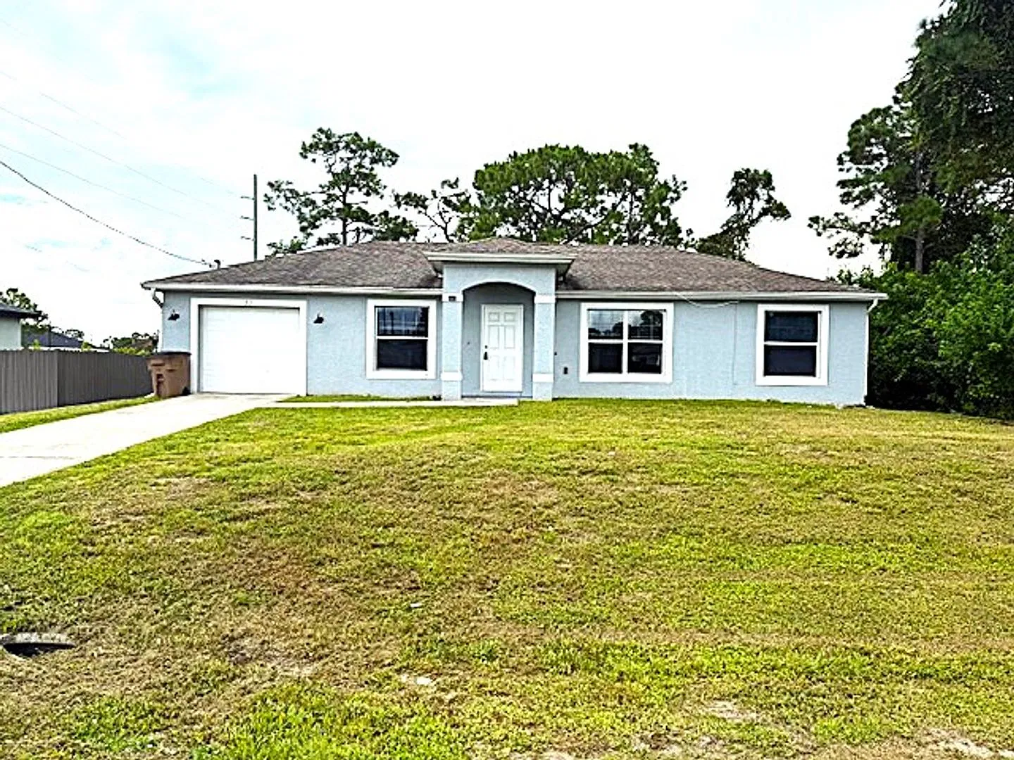 Spacious 3 Bed / 2 Bath Home with Large Backyard in Lehigh Acres — Photo 1