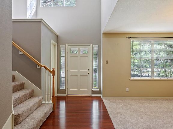 High ceilings and beautiful wood floors greet you when entering this home.