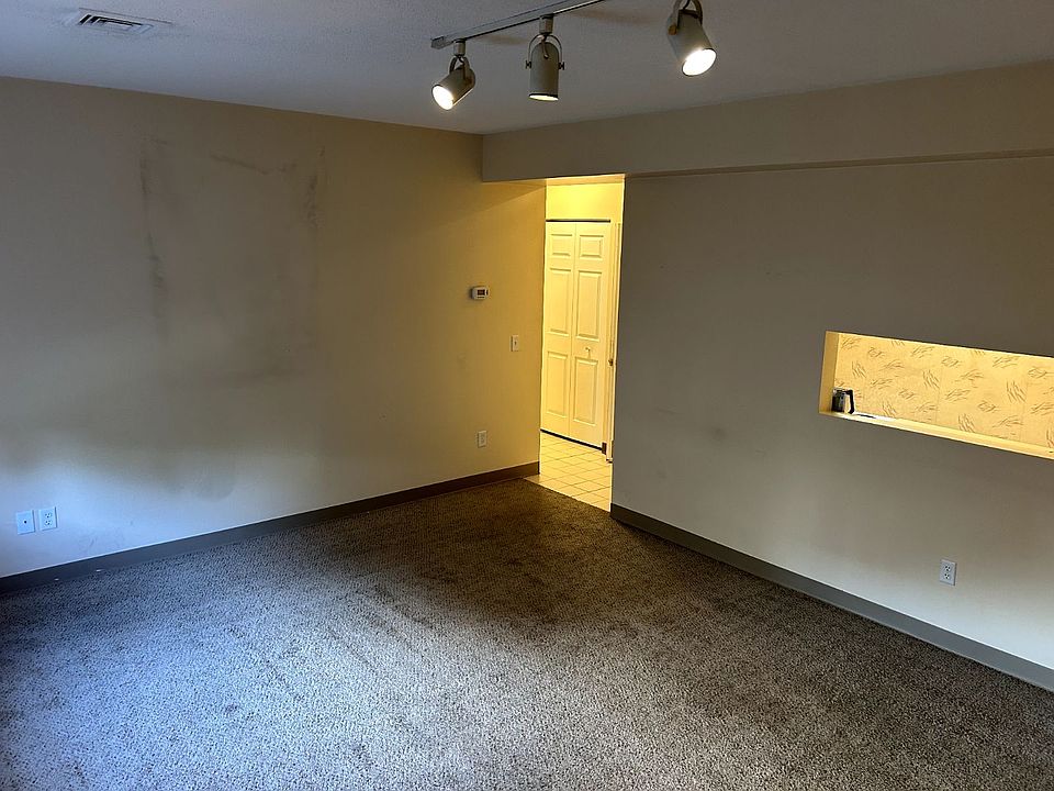 Living room with pass through counter to kitchen.