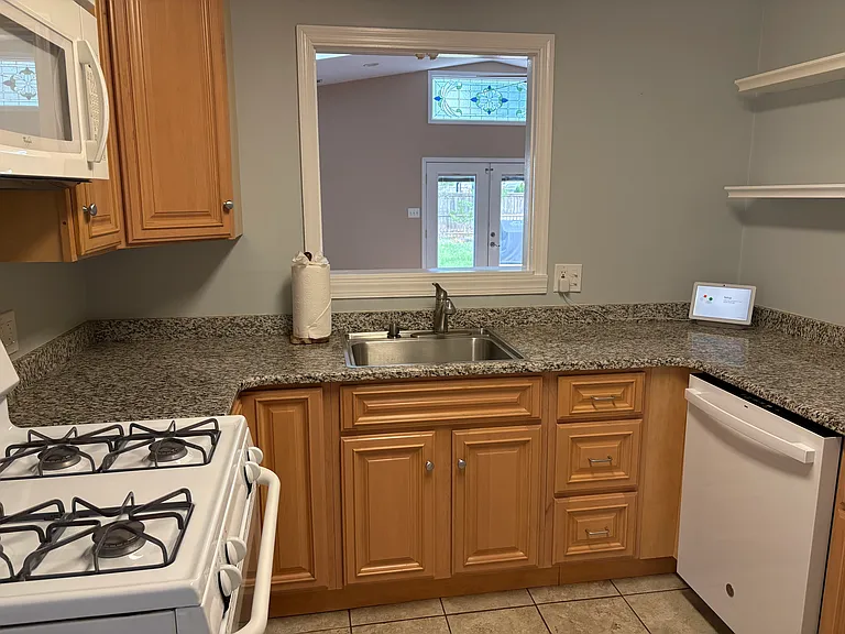 Kitchen with pass through to Family Room