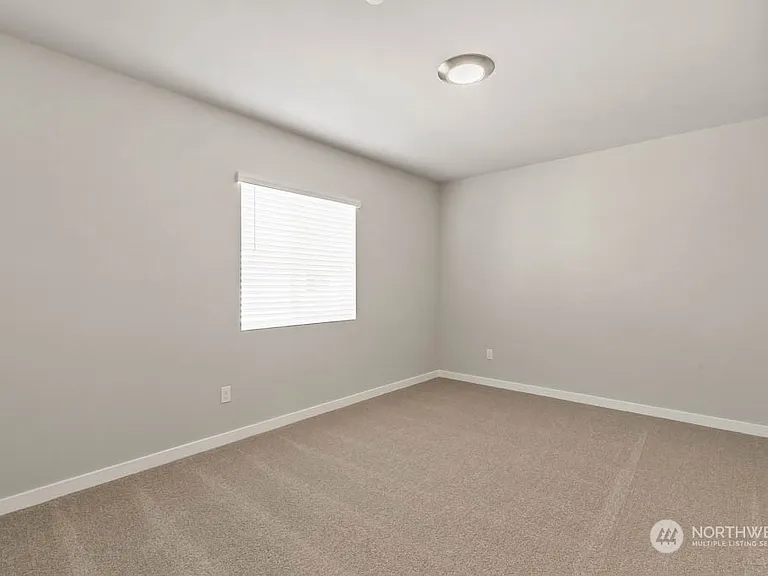 Secondary Bedroom with Large Window