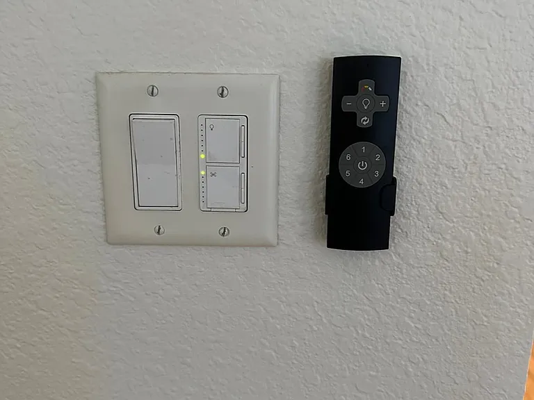 Fan and light remotes in living room and primary bedroom