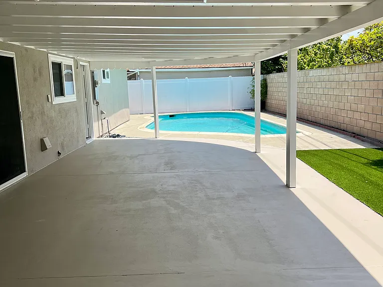 Large covered patio and pool