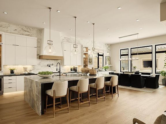 A photo of the Kitchen and Grand Dining in the Brisa model residence at Vista in Orchard Hills.