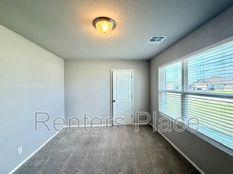 14215 N 74th East Ave — Photo 2