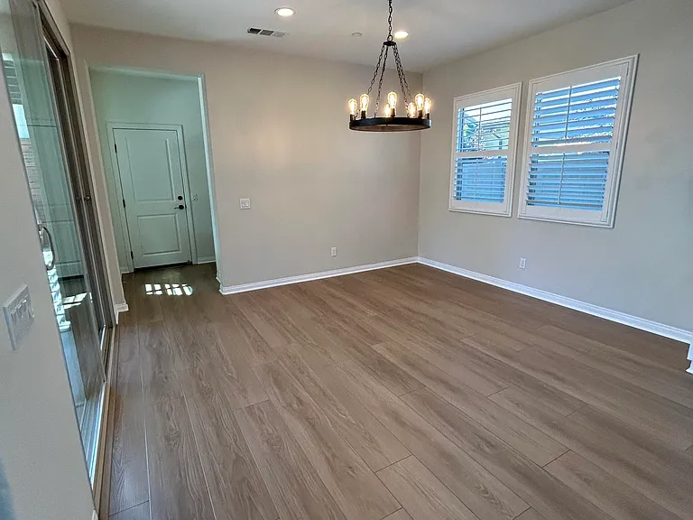 Dining Room with Modern Chandelier.
