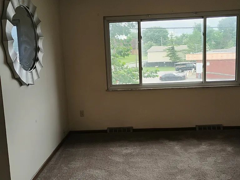 The upstairs living-room window