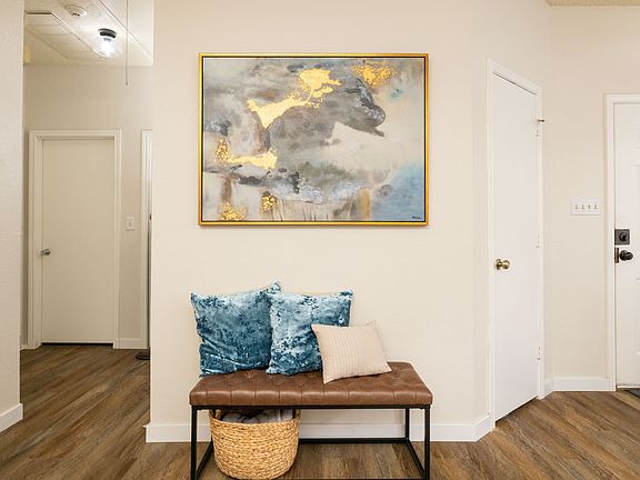 Living room with extra pillows and blankets