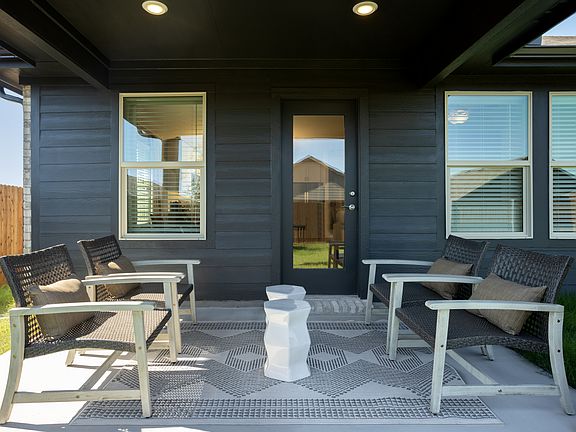 Enjoy the outdoors on the back patio of the Preston
