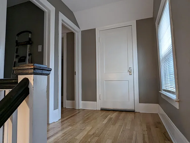 Landing upstairs with window, closet and leading to 2 bedrooms upstairs