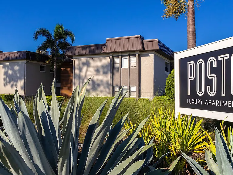 Experience upscale living at Poste Luxury Apartments. Surrounded by lush landscaping and modern design, our community offers a blend of comfort and sophistication in a serene environment.