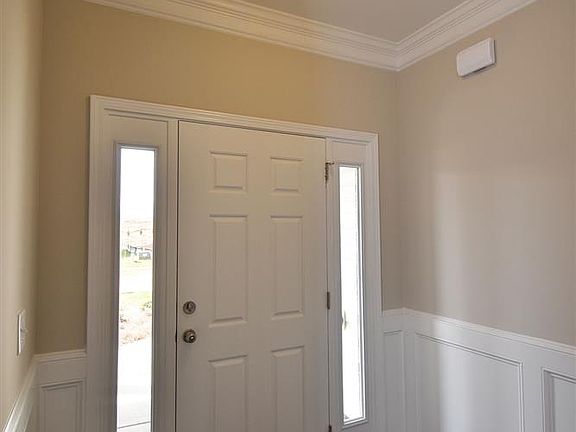 Front door entrance with side lights