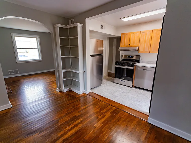1st floor. Dining room, with views toward kitchen and living room.