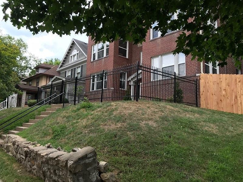 A new rod iron fence and privacy fence has recently been add