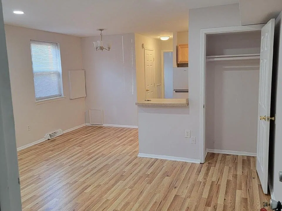 Living Dining Area and coat closet new flooring through out to bedroom 2023 Feb