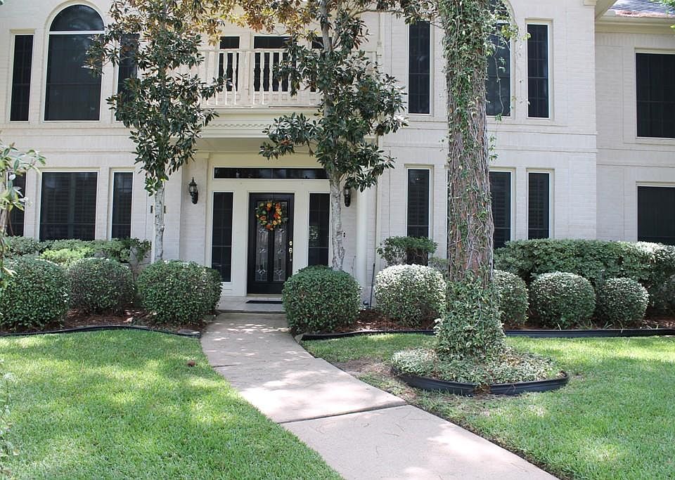 Beautiful front walk welcomes you in