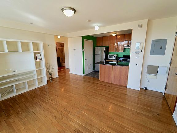 LIVING ROOM W/ OPEN KITCHEN