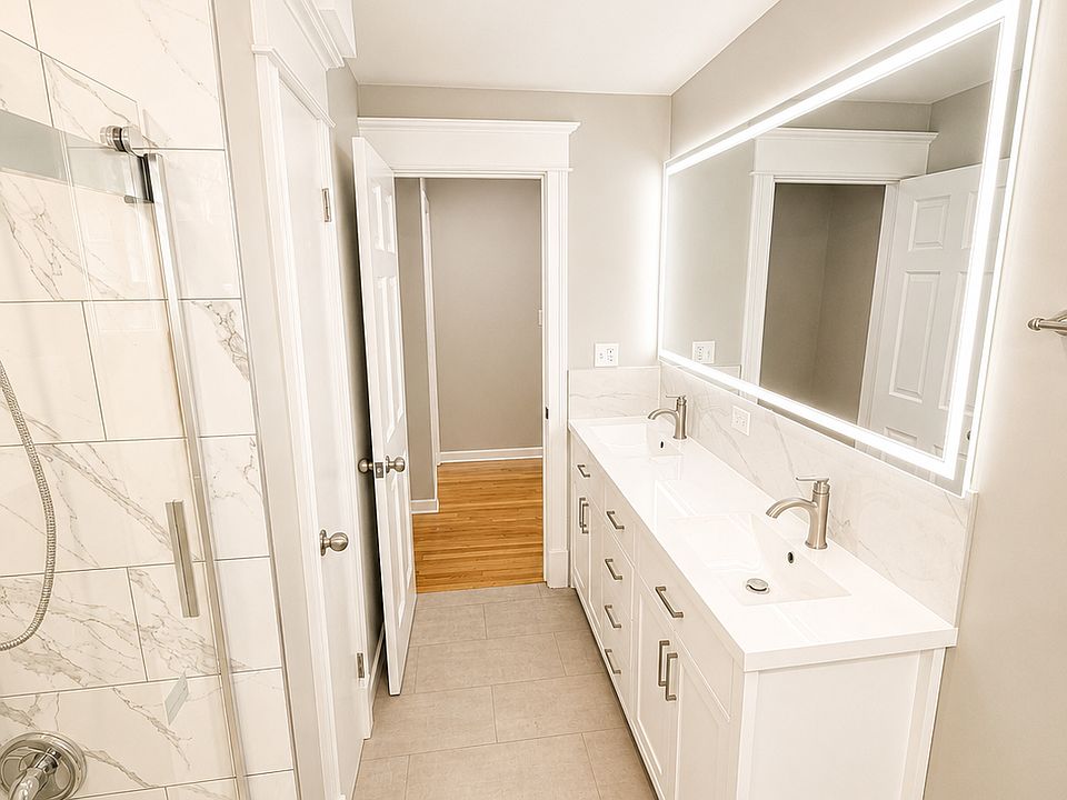 Bathroom with new vanity and sliding glass door
