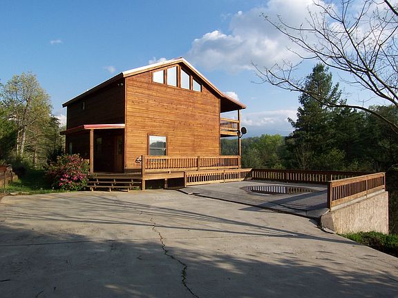 View of cabin as driving up. 
Cabin at end of driveway.
No passing travel except main 
road at bottom on hill (mountain for some.)