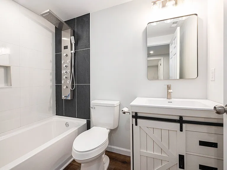 Second full bathroom with shower/tub combo