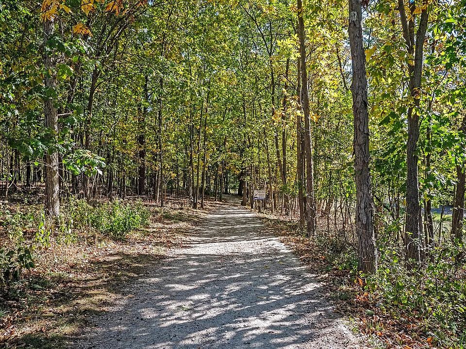 This well-maintained, multi-use rail trail stretches 6.8 miles through lush oak and maple forest, wetlands, and past numerous lakes _ perfect for jogging, walking, or biking