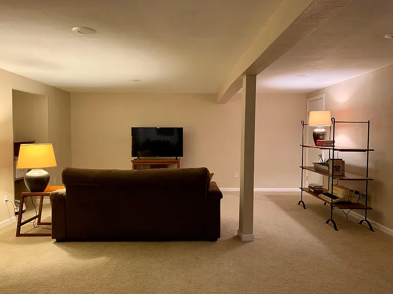 Basement level living room with smart TV