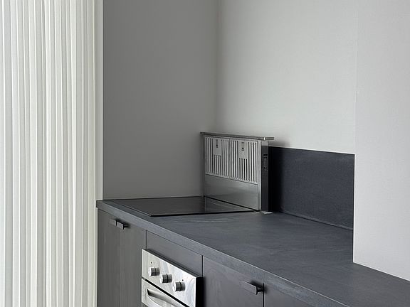 kitchen exhaust vent is concealled below counter when not in use