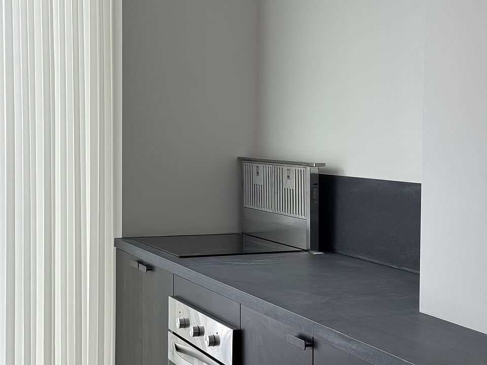 kitchen exhaust vent is concealled below counter when not in use