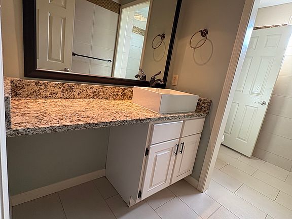 luxurious primary full bathroom.