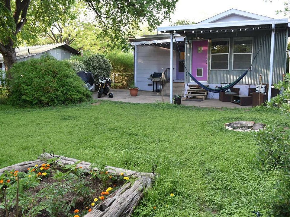 back yard with covered porch