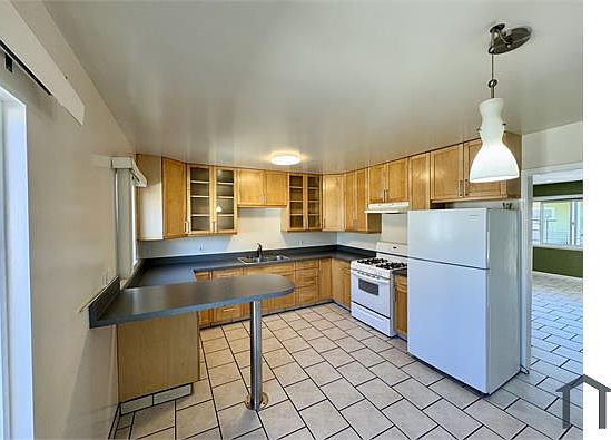 2nd image of 3418 School St #4
