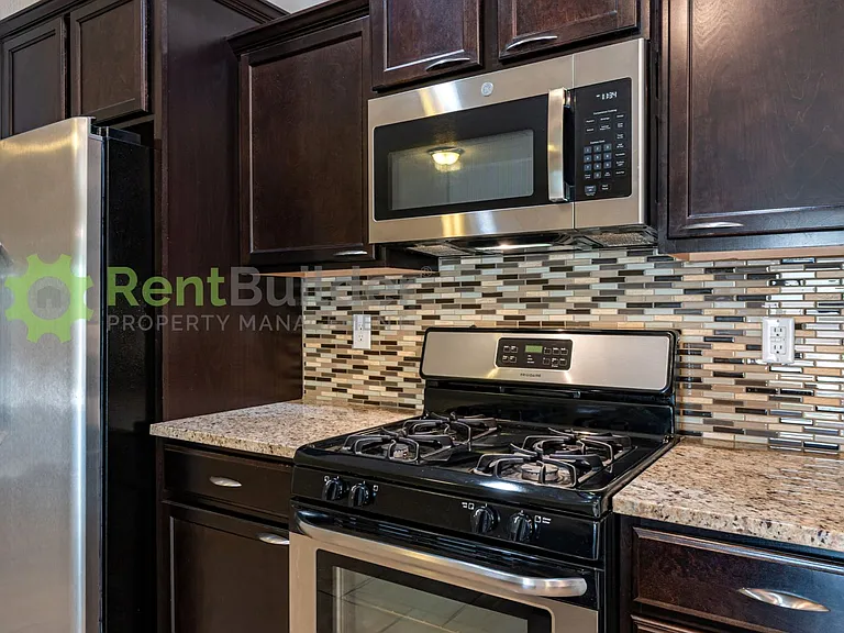 6936 Tombstone Rd NW — Photo 8