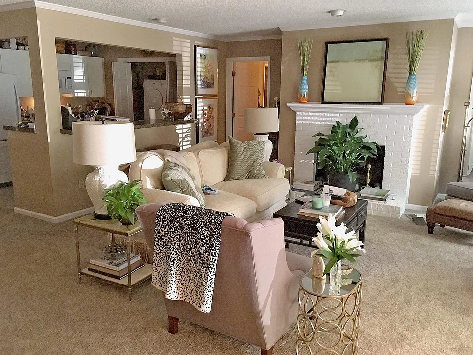 Beautiful living area with gas log fireplace.