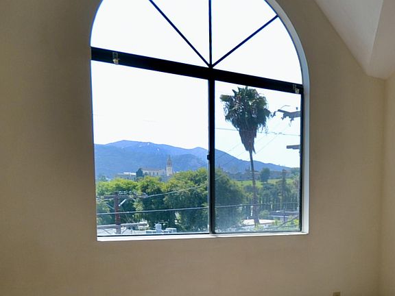 View from primary bedroom of Griffith Park and historic Forest Lawn architecture