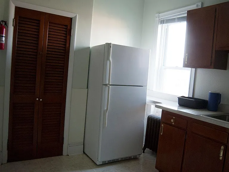 Kitchen is all electric with full sized appliances, cabinets, and large pantry.