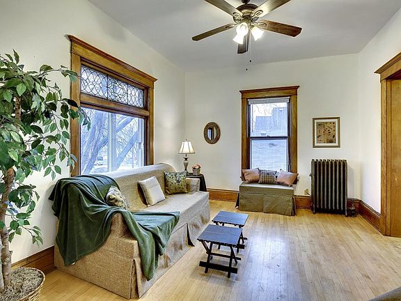 Sunny and large living area with super cool stained glass wi