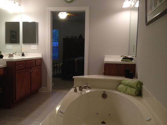 Double vanity master bath with jet tub and separate shower