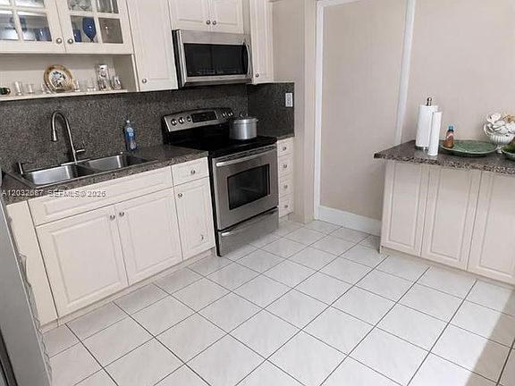 5th image of 4596 E 8th Ct