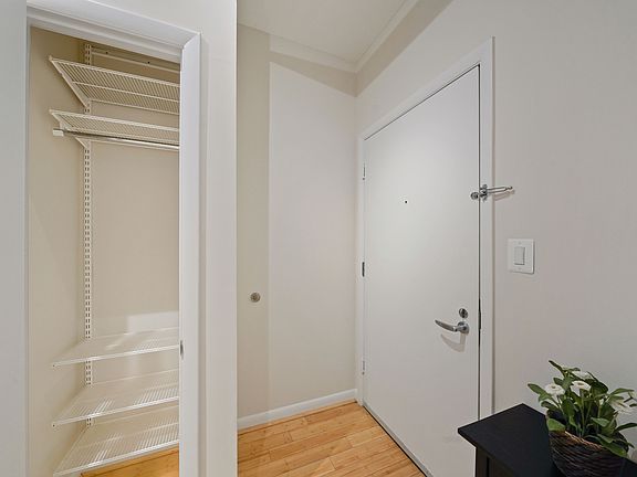 Coat closet off front door.