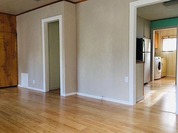 Living room looking into kitchen