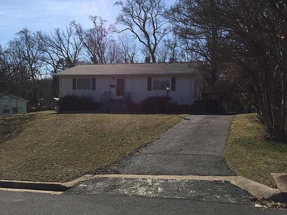 Driveway and handicap ramp to kitchen door