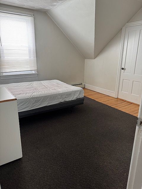 2nd bedroom new boxspring and mattress with large closet